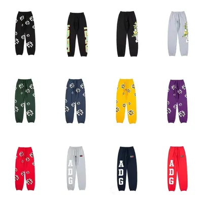 Rows of printed joggers in black, green, navy, yellow, purple, red and grey