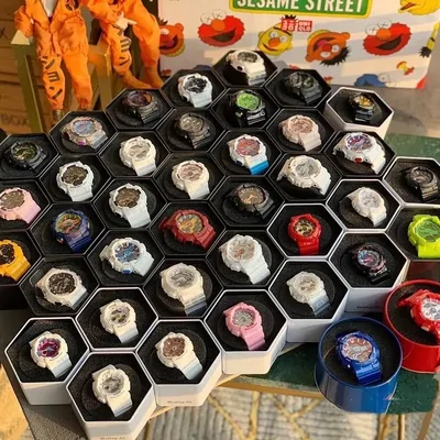 Display of colourful digital sports watches in a hexagon stand